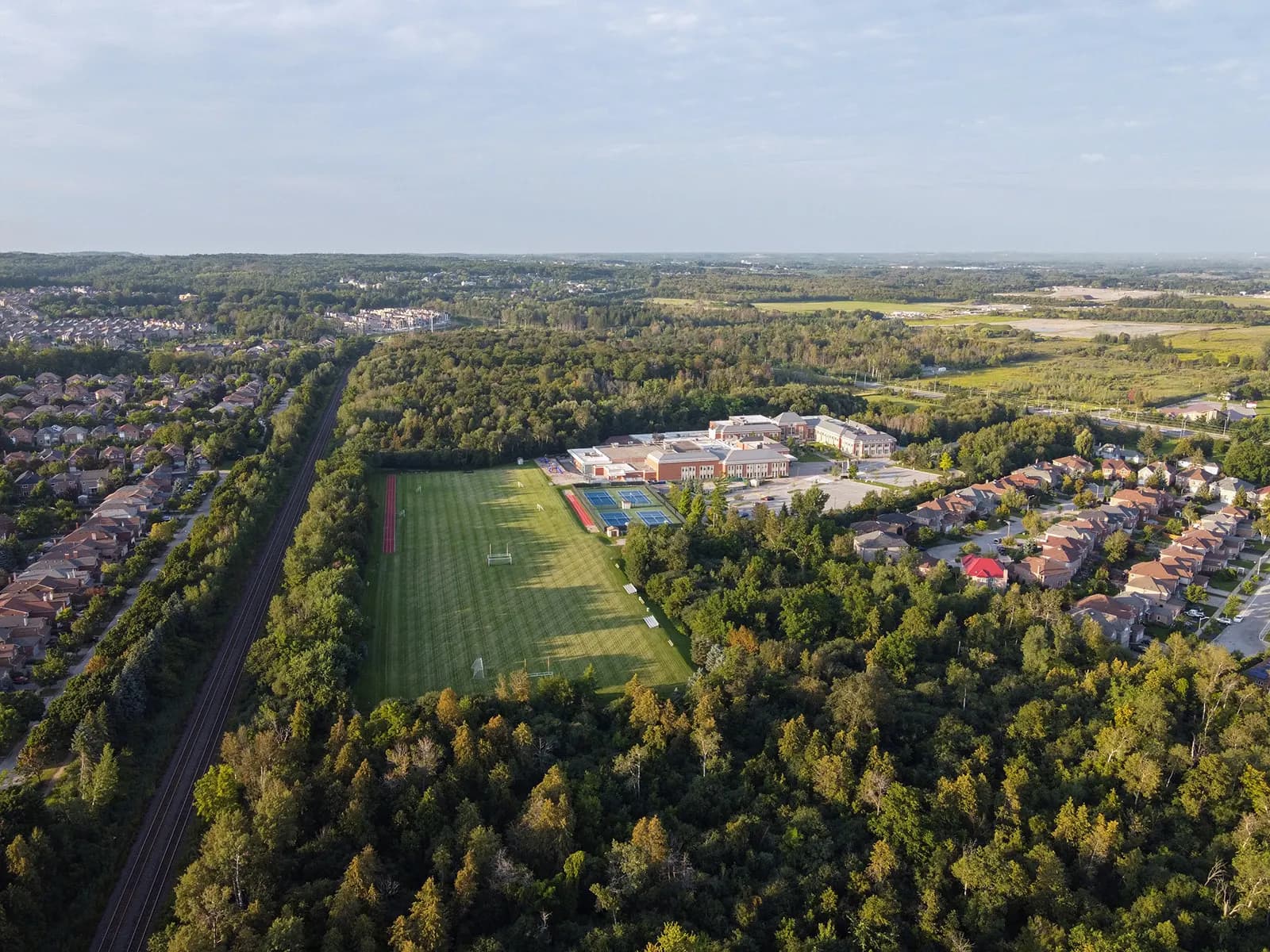 Aerial view of the Holy Trinity School campus and playing fields in Richmond Hill